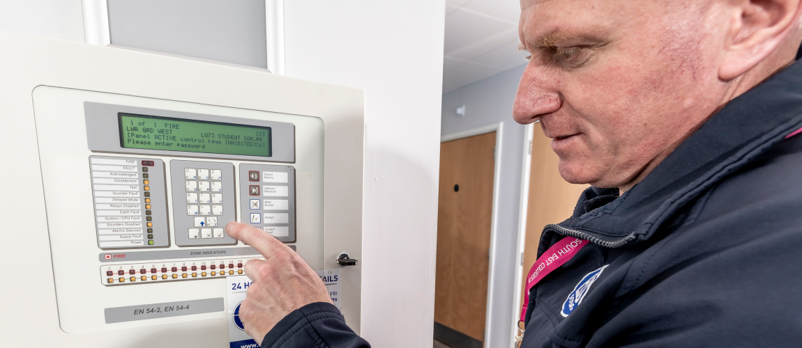 how often should fire alarms be tested schools